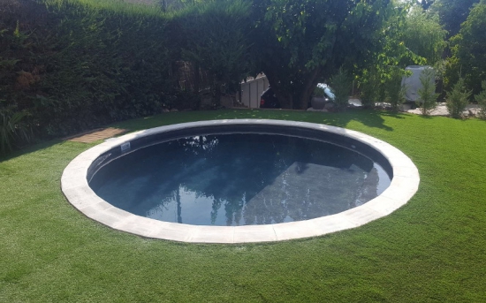 Piscina privada acondicionament jardi